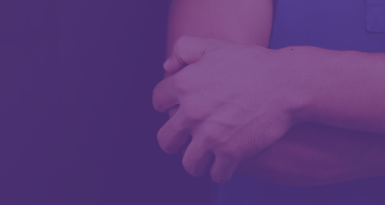 person holding elbow